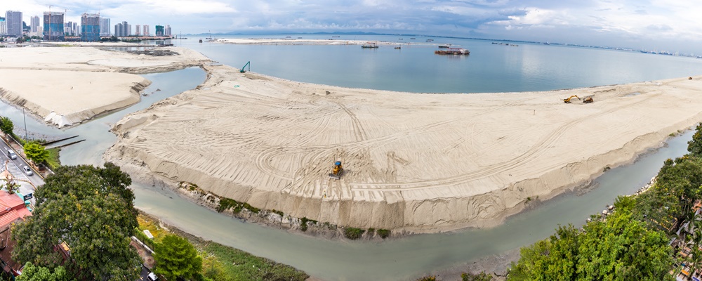 Aerial panoramic view of Penang's Gurney Drive sea reclamation